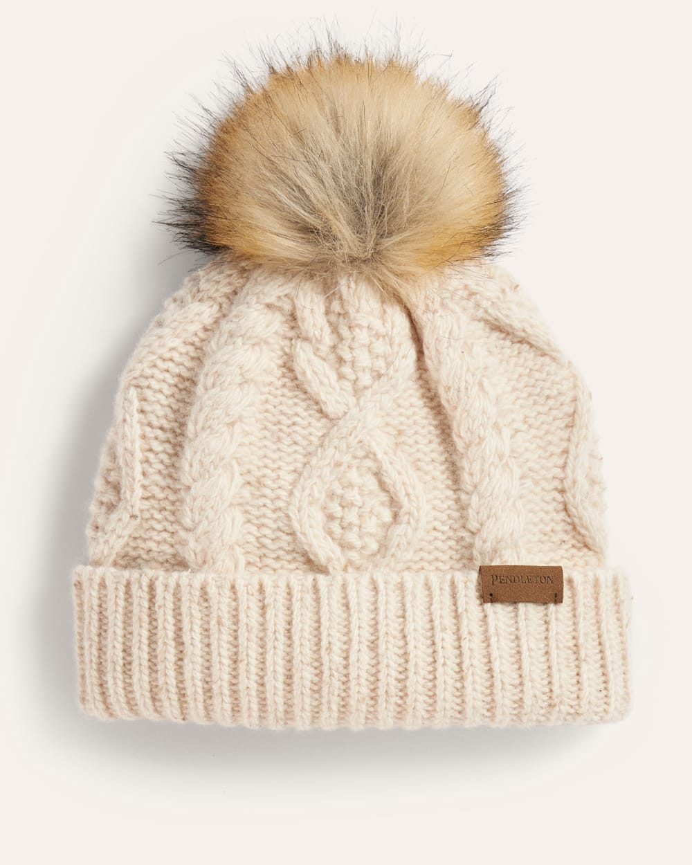 CABLE KNIT POM BEANIE IN IVORY DONEGAL image number 1