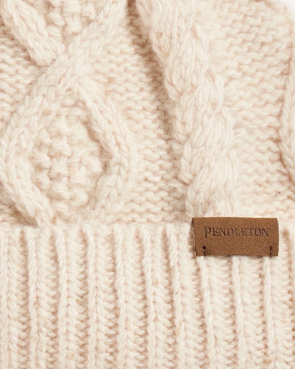 ALTERNATE VIEW OF CABLE KNIT POM BEANIE IN IVORY DONEGAL image number 2