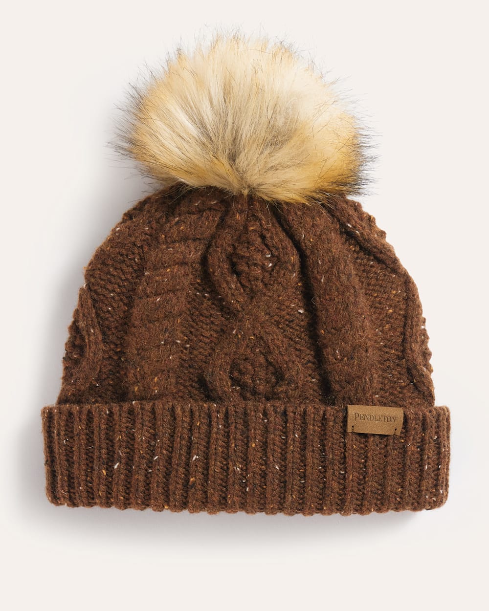 CABLE KNIT POM BEANIE IN WALNUT DONEGAL image number 1