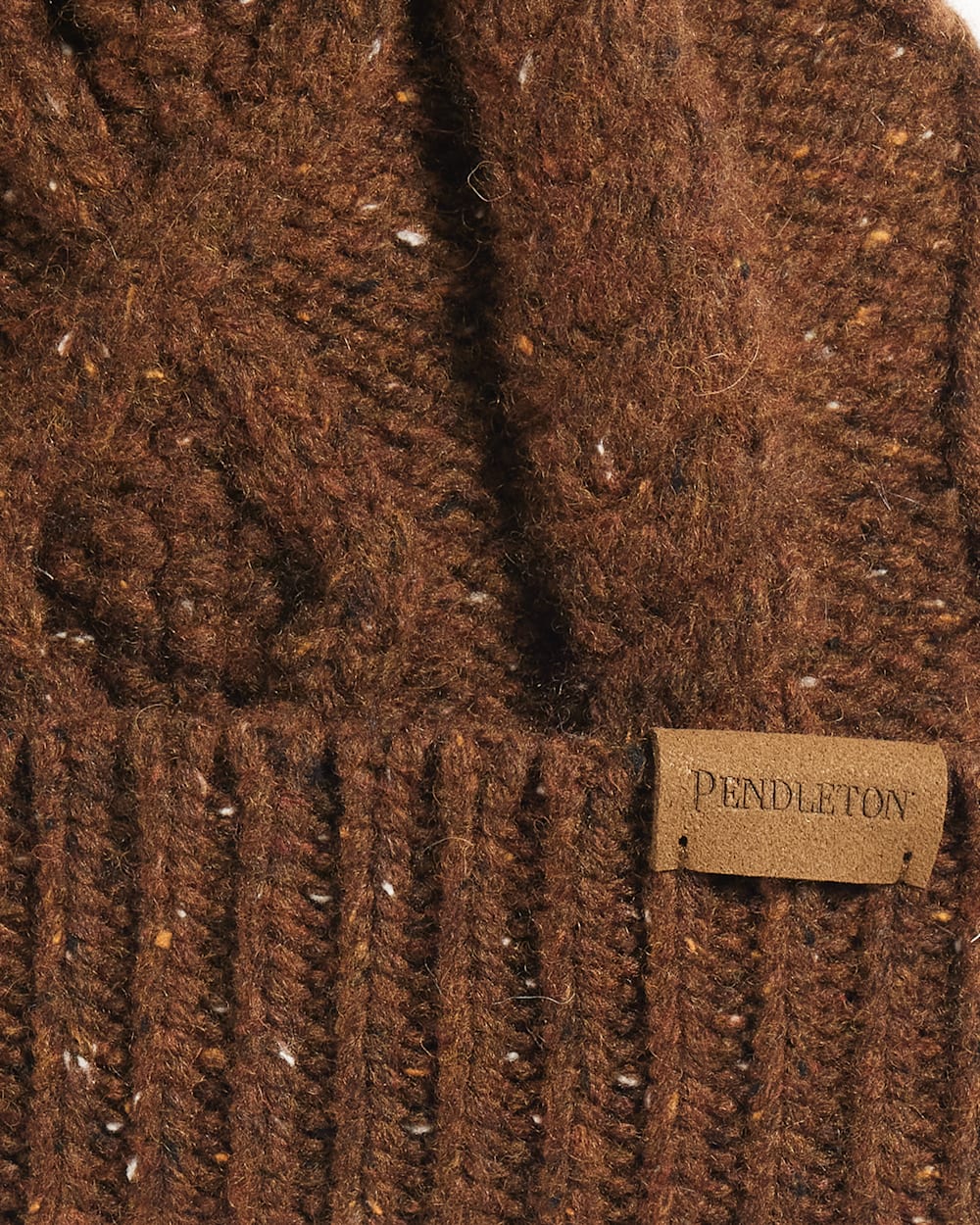 ALTERNATE VIEW OF CABLE KNIT POM BEANIE IN WALNUT DONEGAL image number 2