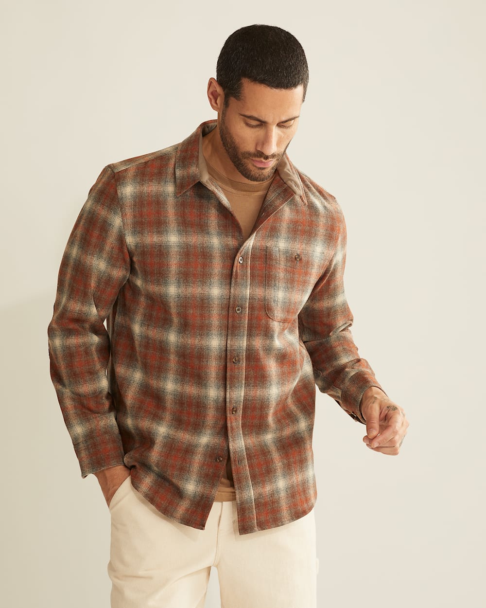 CLOSE UP VIEW OF MEN'S PLAID ELBOW-PATCH TRAIL SHIRT IN GREY/COPPER OMBRE image number 6