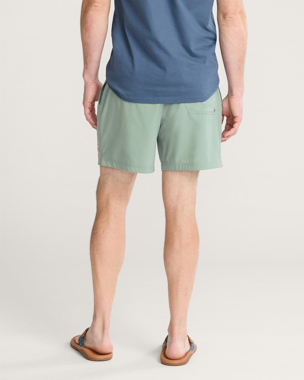 ALTERNATE VIEW OF TROPICAL HYDROMORPH SWIM TRUNKS IN CHINOIS GREEN image number 3