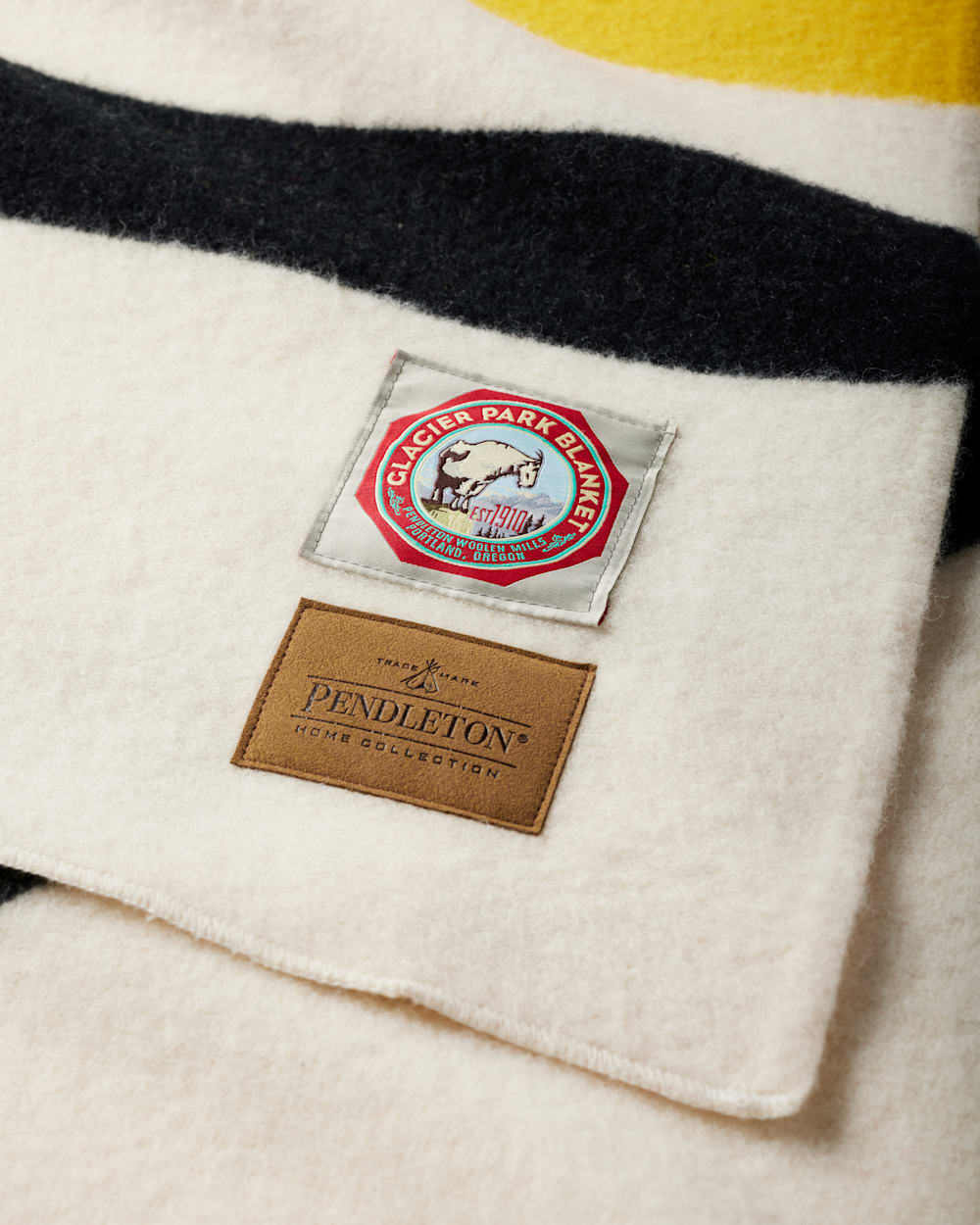 CLOSE UP VIEW OF GLACIER NATIONAL PARK BLANKET IN WHITE image number 2