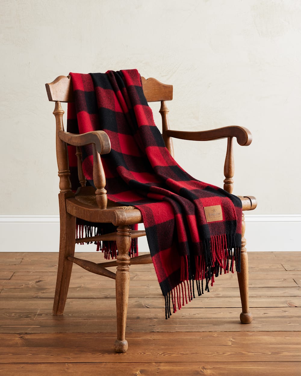 MOTOR ROBE THROW WITH LEATHER CARRIER IN ROB ROY TARTAN DRAPED OVER A CHAIR image number 3