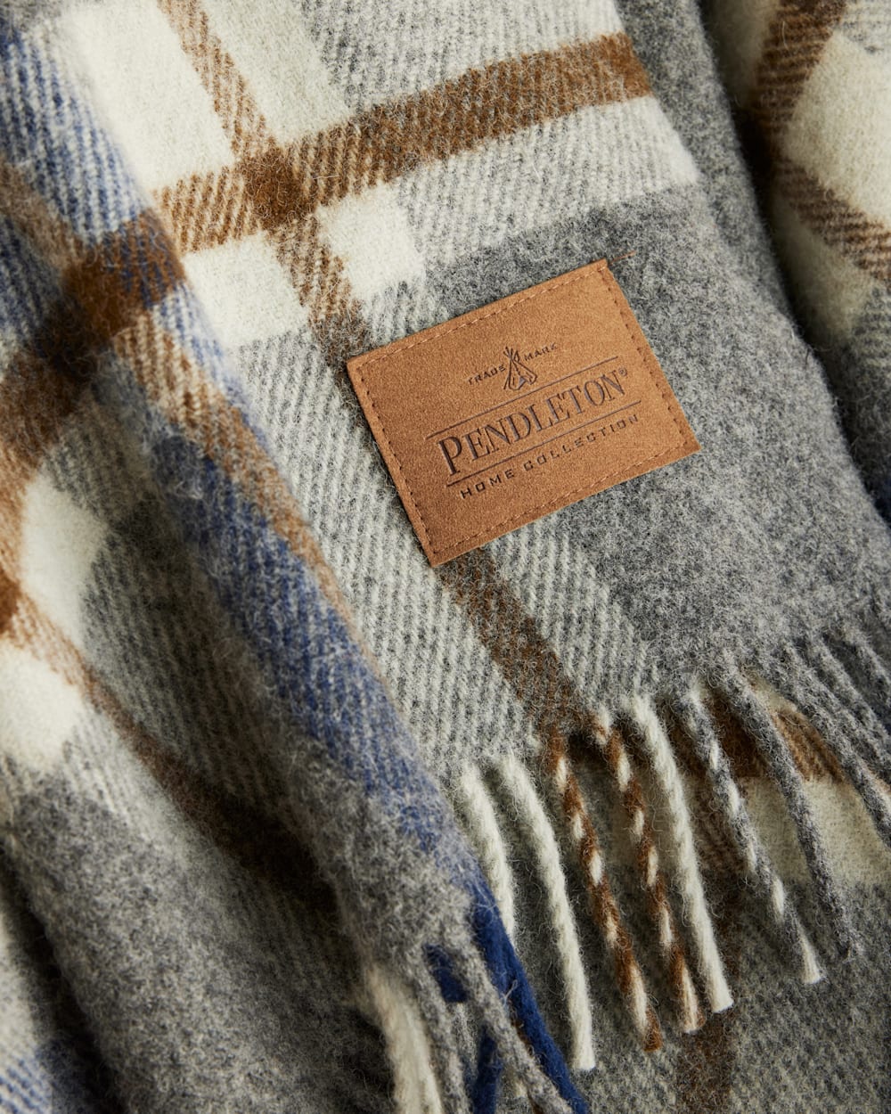 ALTERNATE VIEW OF MOTOR ROBE THROW WITH LEATHER CARRIER IN RALEIGH PLAID image number 4