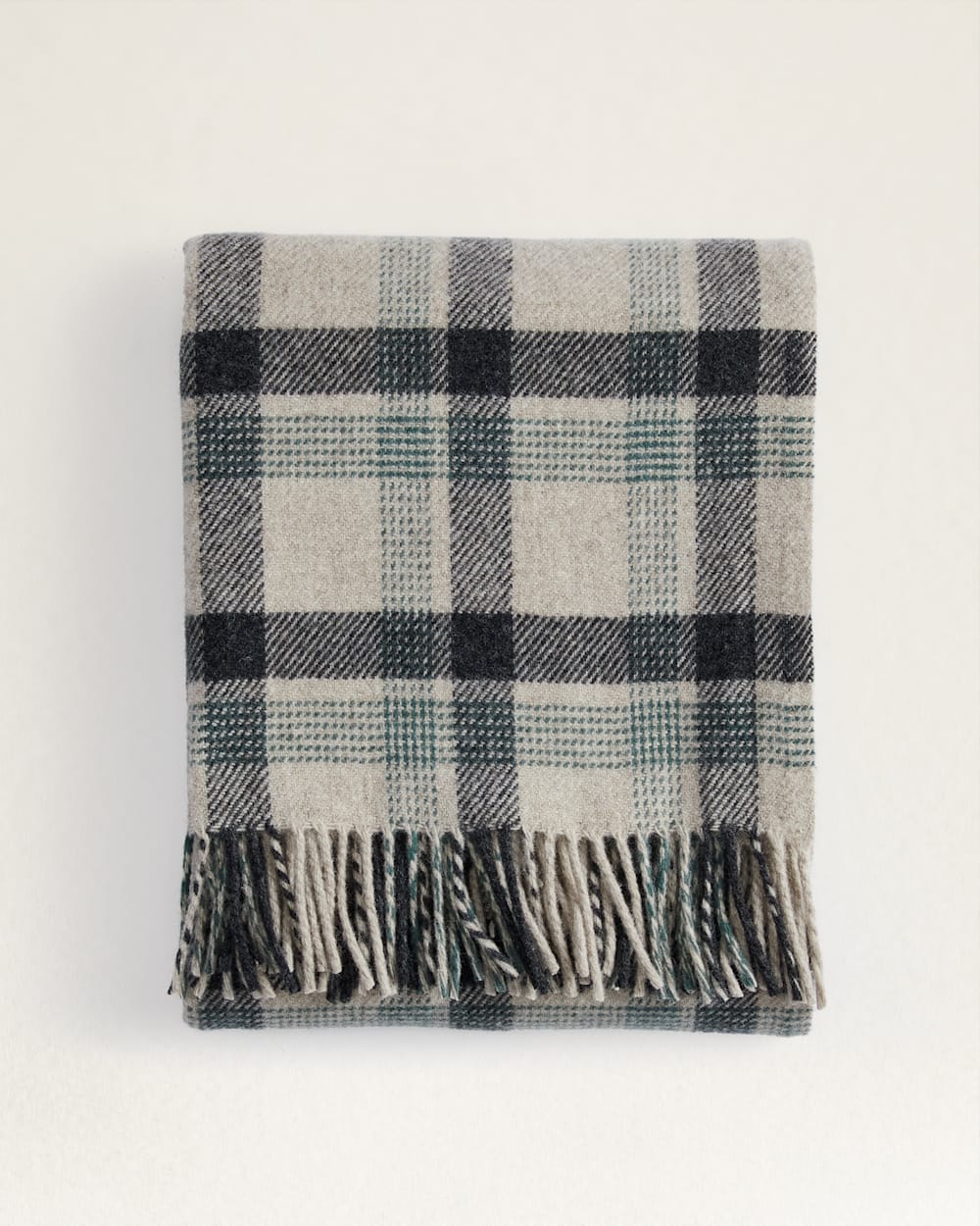 FOLDED VIEW OF ECO-WISE WOOL FRINGED THROW IN OAT KELSO PLAID image number 1