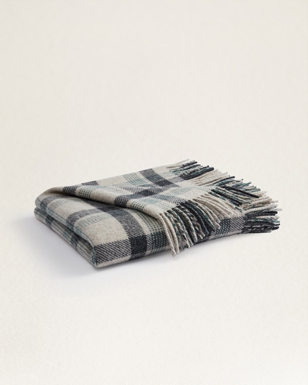 FLAT FOLDED VIEW OF ECO-WISE WOOL FRINGED THROW IN OAT KELSO PLAID image number 4