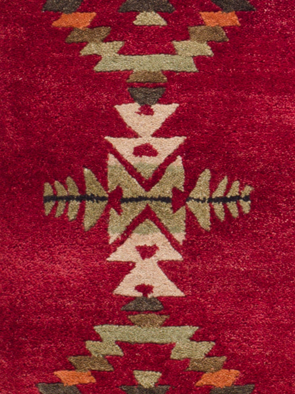 CLOSE UP OF HANDMADE GATEKEEPER RUG IN RED image number 3