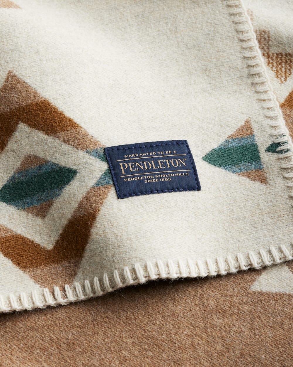 ALTERNATE VIEW OF ROCK POINT SADDLE BLANKET IN IVORY image number 3