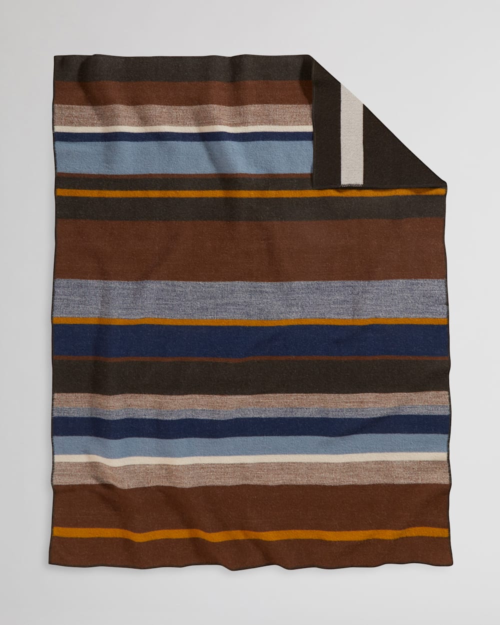 BRIDGER WOOL THROW WITH CARRIER IN BLACK TRAIL STRIPE image number 1