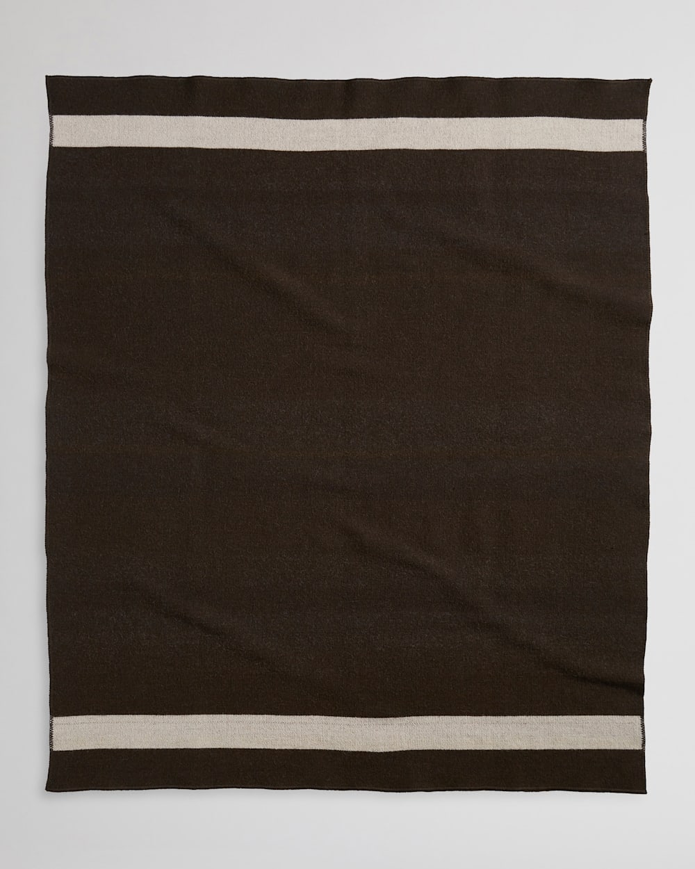 ALTERNATE VIEW OF BRIDGER WOOL THROW WITH CARRIER IN BLACK TRAIL STRIPE image number 3