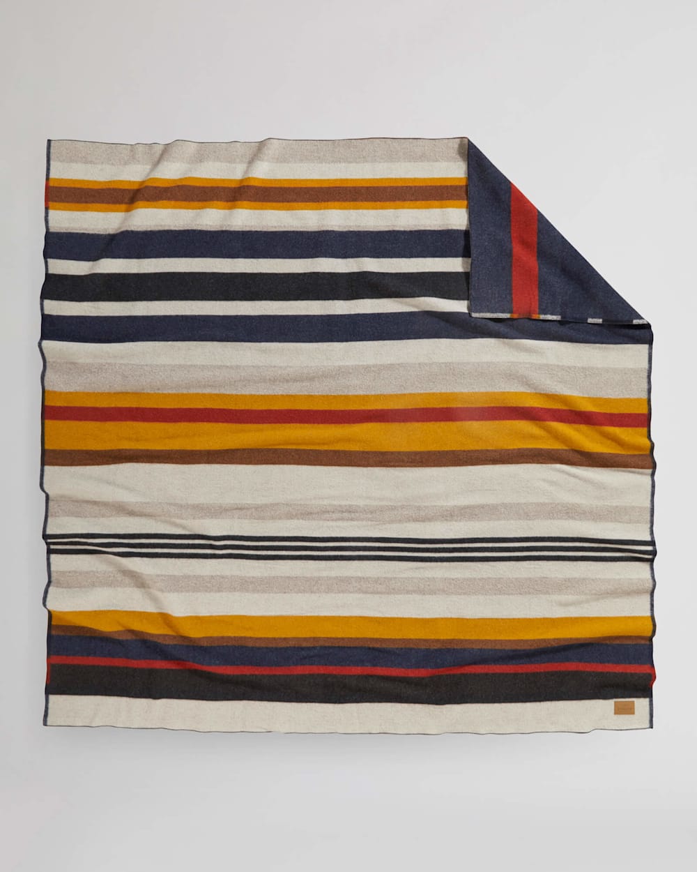 BRIDGER STRIPE BLANKET IN NAVY CASCADE STRIPE image number 1