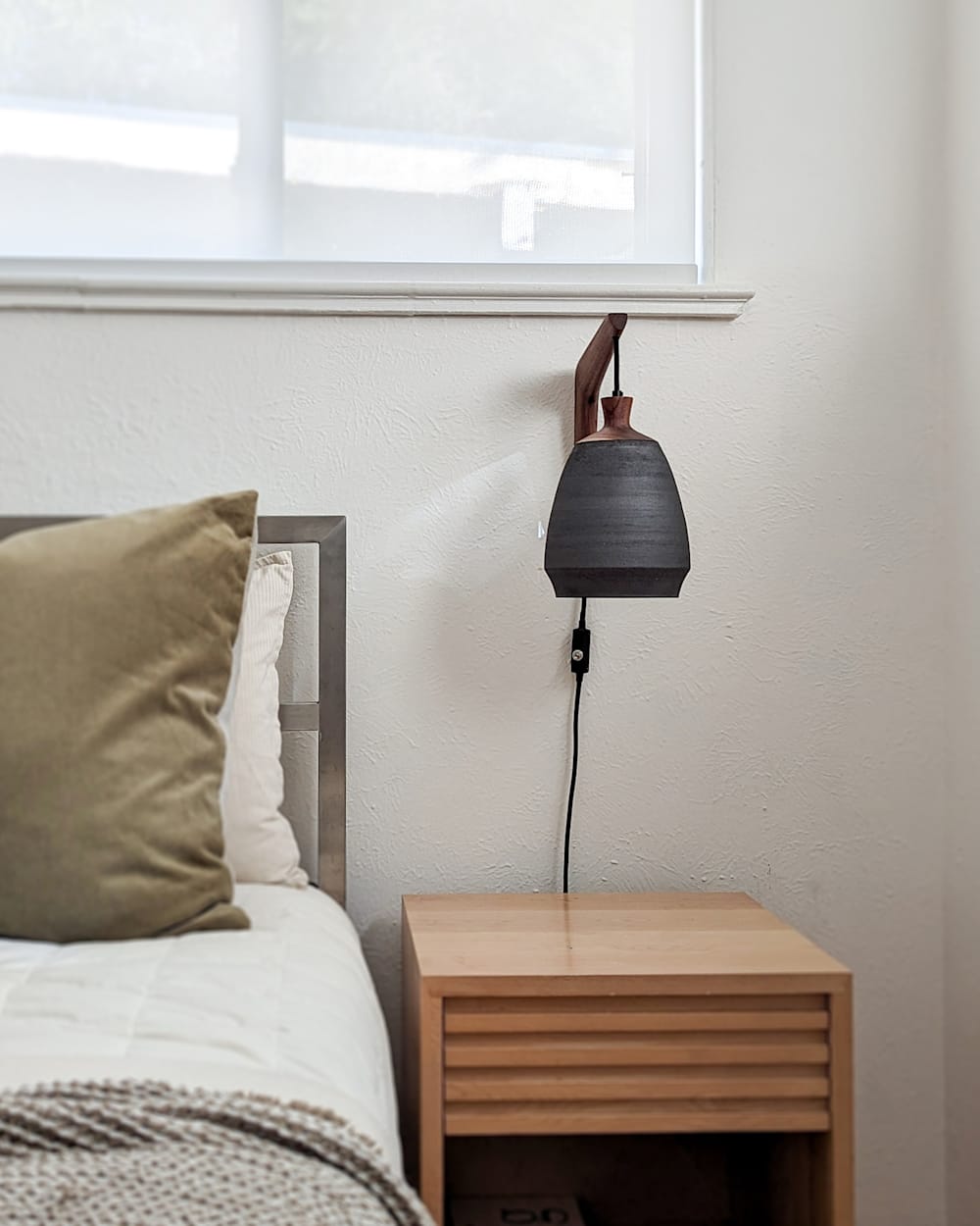 ALTERNATE VIEW OF PARK SLOPE CERAMIC PLUG-IN SCONCE IN MATTE BLACK image number 3