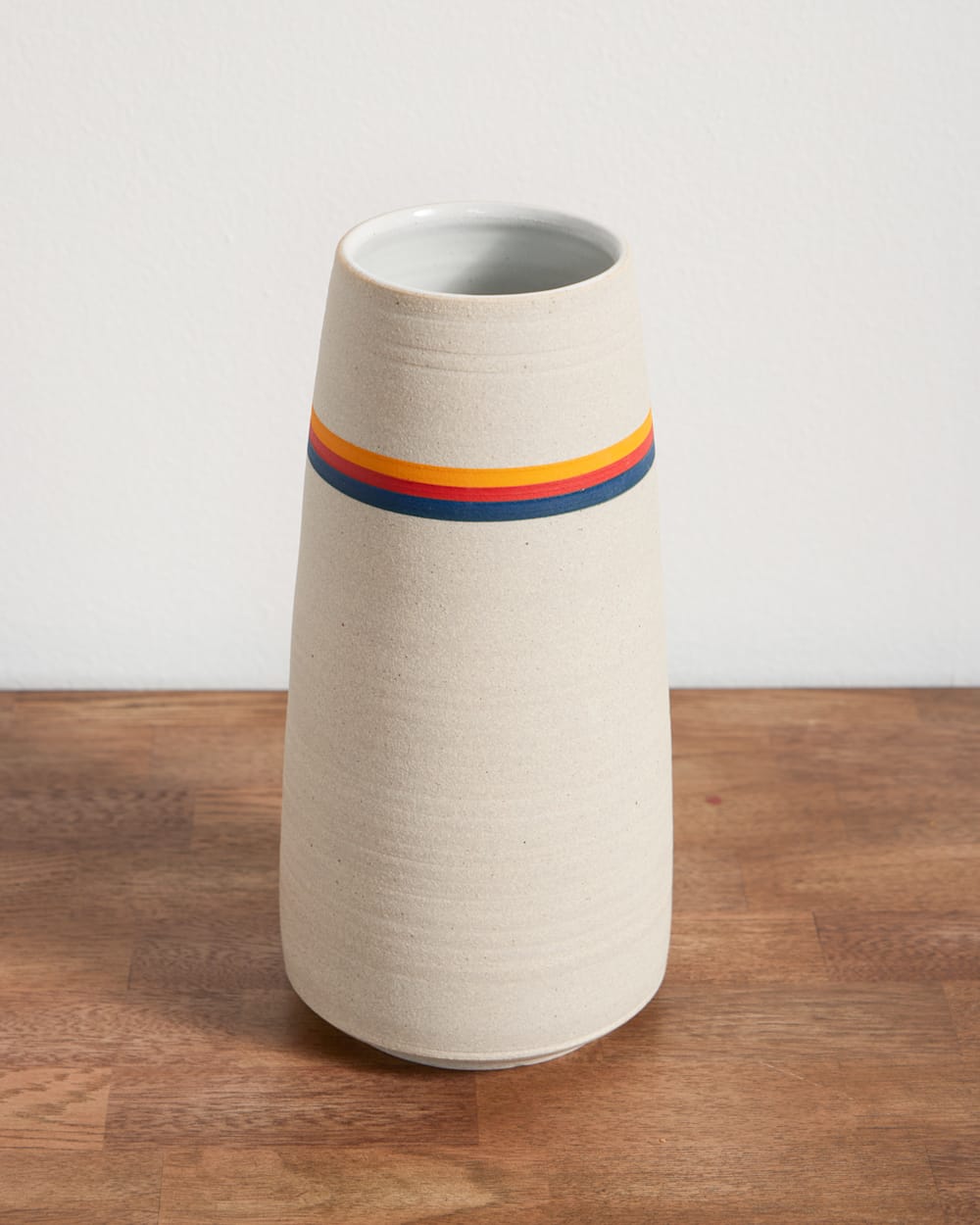 HANDMADE STONEWARE & WOOD STEM VASE IN SUNSET STRIPE image number 1