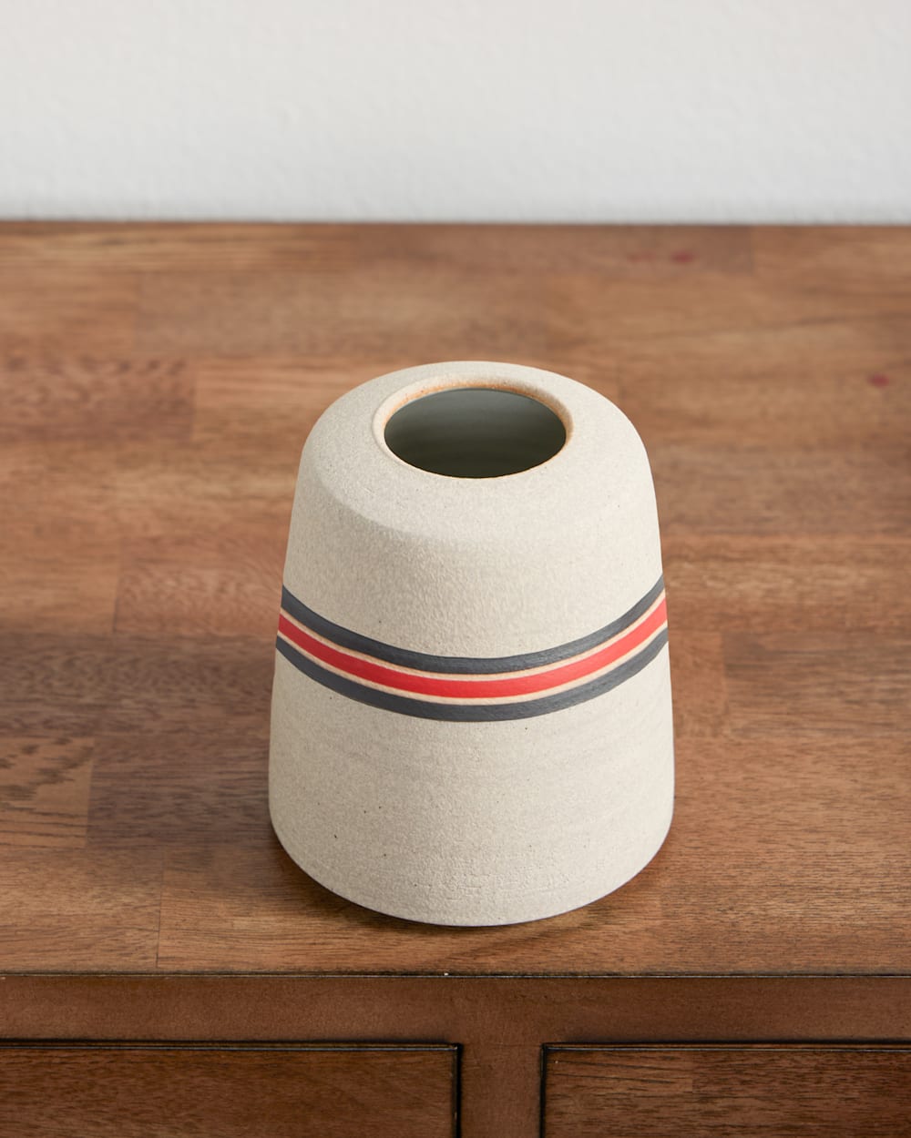 HANDMADE STONEWARE & WOOD BUD VASE IN RED/BLACK STRIPE image number 1