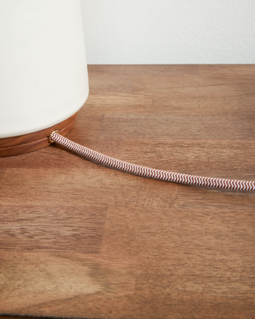 ALTERNATE VIEW OF HANDMADE STONEWARE & WOOD TABLE LAMP IN RED/BLACK STRIPE image number 4