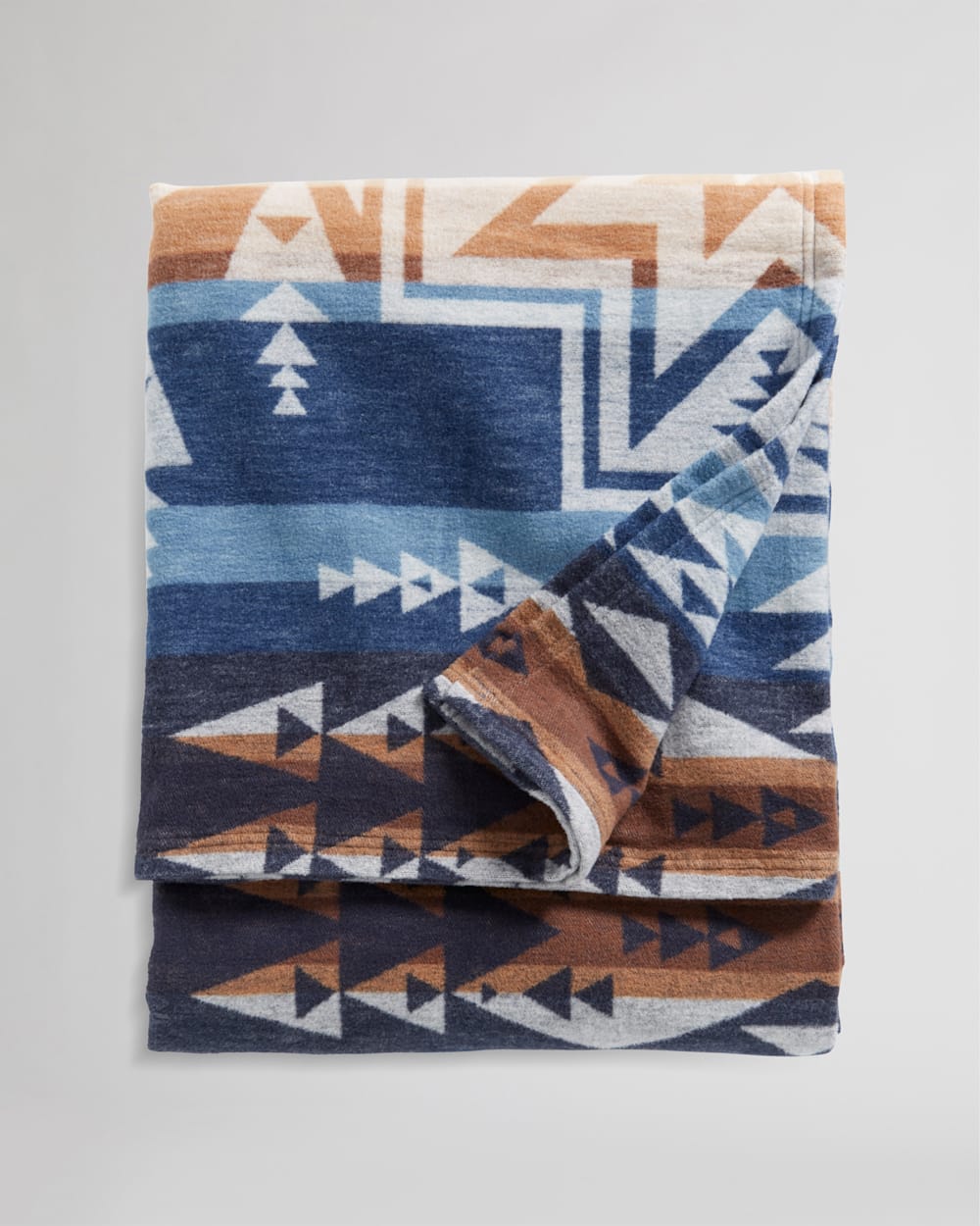FOLDED VIEW OF SILVER CITY ORGANIC COTTON BLANKET IN DENIM image number 1