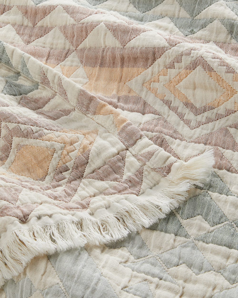 ALTERNATE VIEW OF ORGANIC COTTON FRINGED THROW IN AQUA HIGHLAND PEAK image number 4