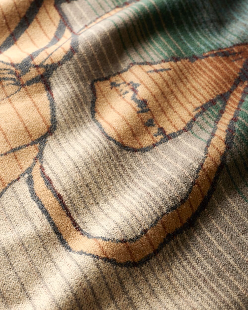 CLOSE UP VIEW OF THE LAST DROP FROM HIS STETSON SPECIAL EDITION BLANKET IN BLUE/TAN image number 7