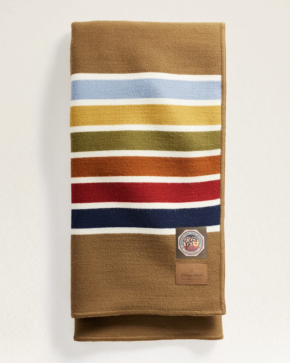 FOLDED VIEW OF JOSHUA TREE NATIONAL PARK THROW WITH CARRIER IN CAMEL image number 4