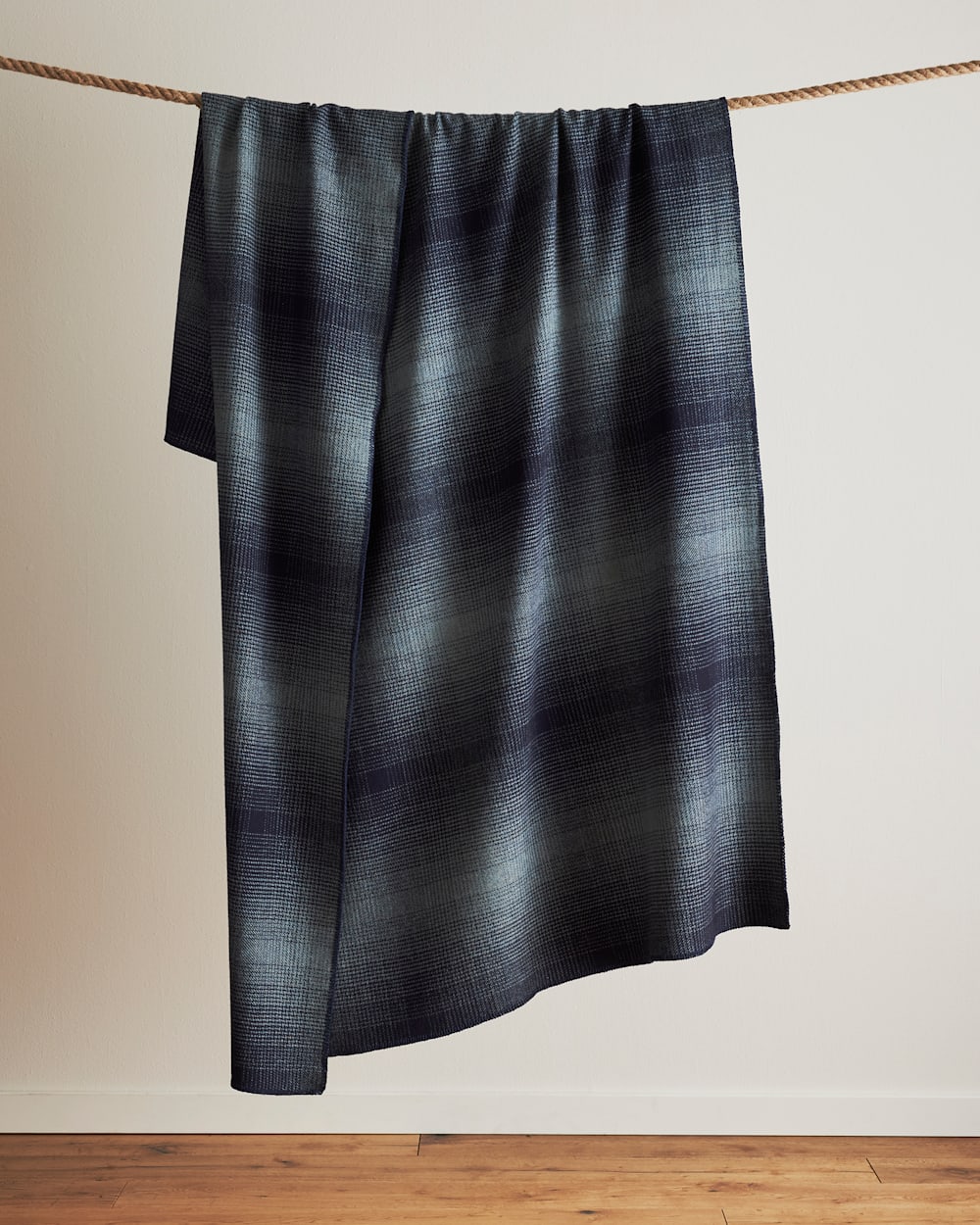 HANGING VIEW OF ECO-WISE WOOL OMBRE BLANKET IN SHALE/NAVY image number 4