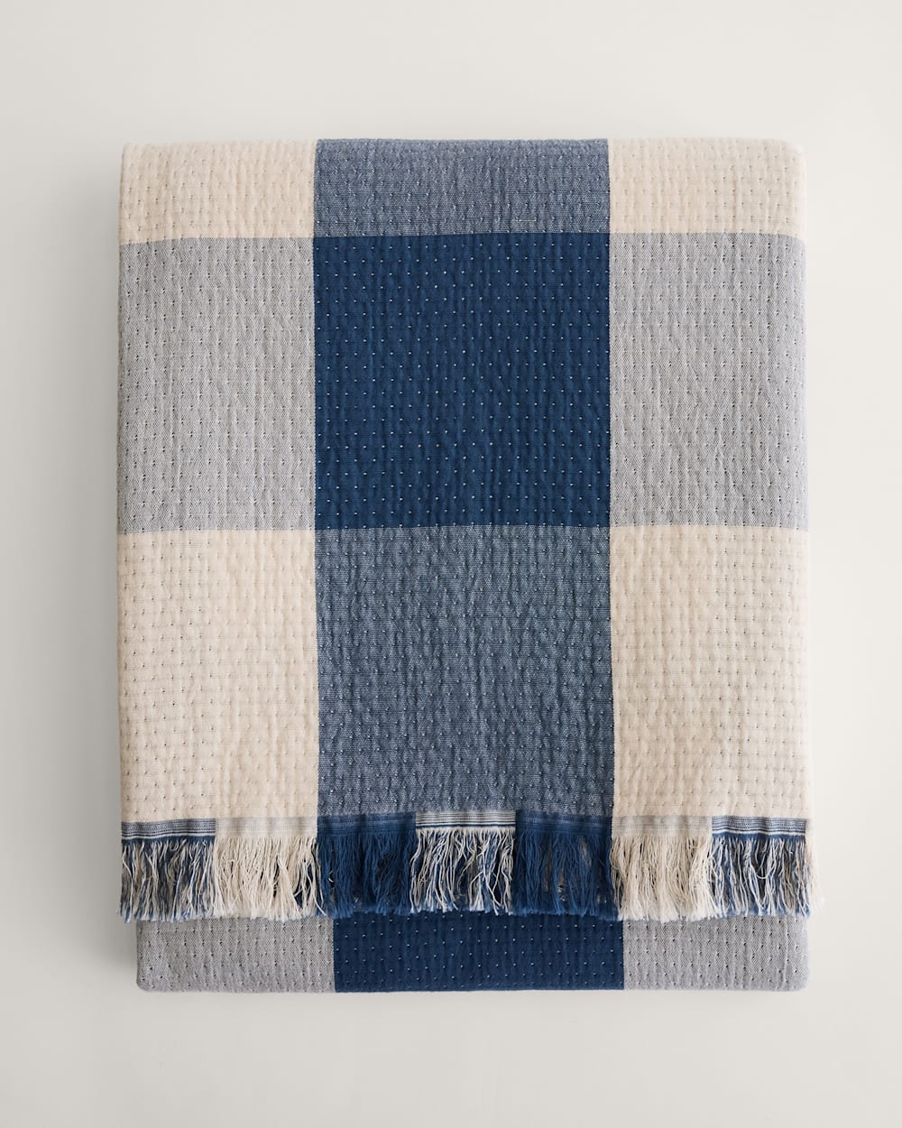 ALTERNATE VIEW OF BLOCK PLAID ORGANIC COTTON FRINGED THROW IN INDIGO/IVORY image number 4