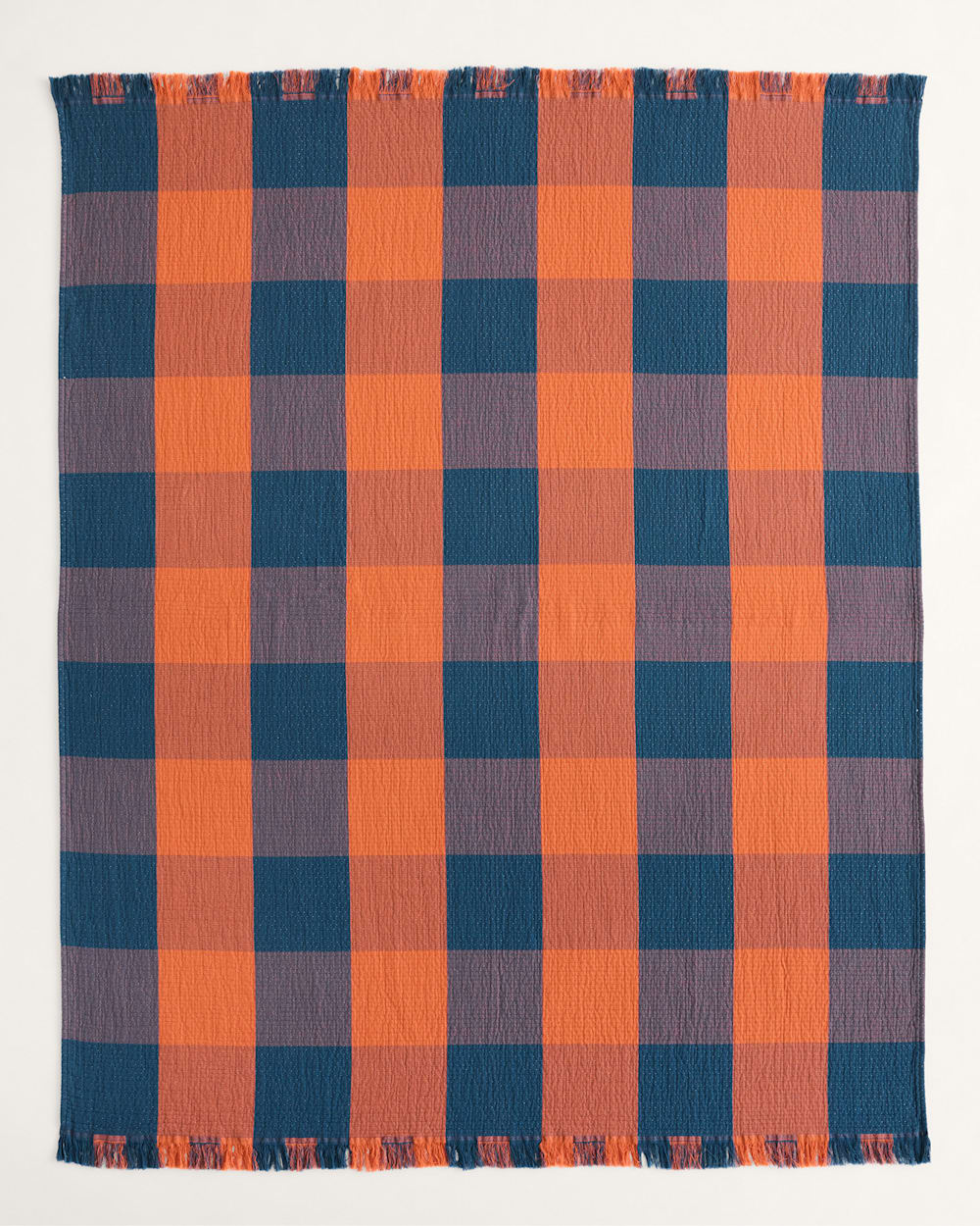 ALTERNATE VIEW OF BLOCK PLAID ORGANIC COTTON FRINGED THROW IN COPPER/INDIGO image number 3