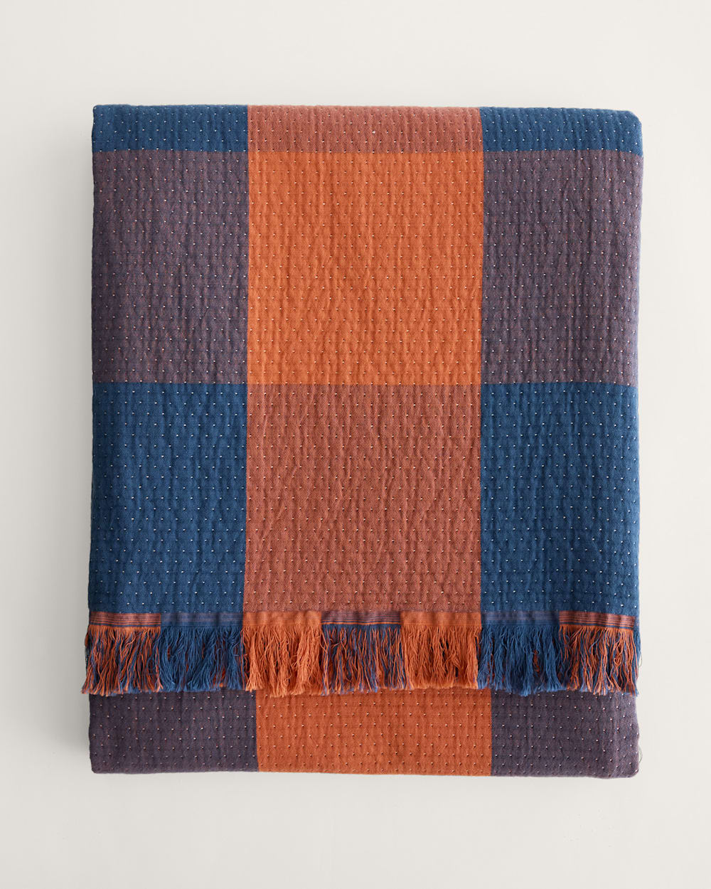 ALTERNATE VIEW OF BLOCK PLAID ORGANIC COTTON FRINGED THROW IN COPPER/INDIGO image number 6