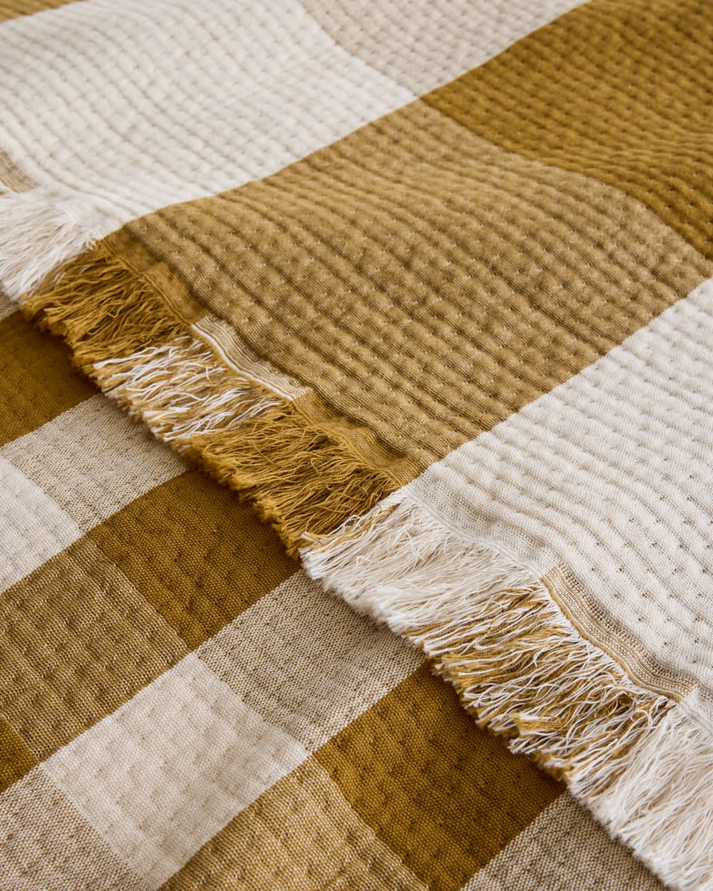 ALTERNATE VIEW OF BLOCK PLAID ORGANIC COTTON FRINGED THROW IN OCHRE/IVORY image number 4