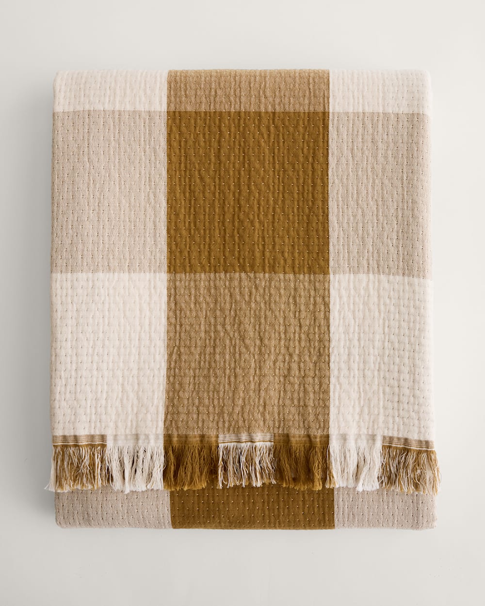 ALTERNATE VIEW OF BLOCK PLAID ORGANIC COTTON FRINGED THROW IN OCHRE/IVORY image number 6