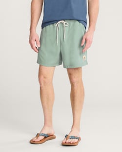TROPICAL HYDROMORPH SWIM TRUNKS IN CHINOIS GREEN image number 1