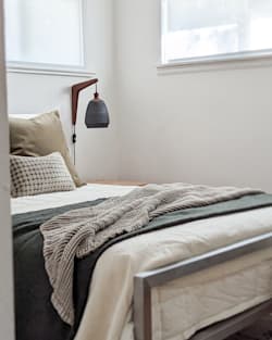 ALTERNATE VIEW OF PARK SLOPE CERAMIC PLUG-IN SCONCE IN MATTE BLACK image number 2