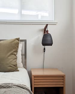 ALTERNATE VIEW OF PARK SLOPE CERAMIC PLUG-IN SCONCE IN MATTE BLACK image number 3