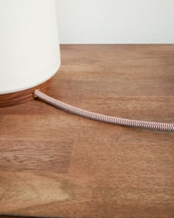 ALTERNATE VIEW OF HANDMADE STONEWARE & WOOD TABLE LAMP IN RED/BLACK STRIPE image number 4