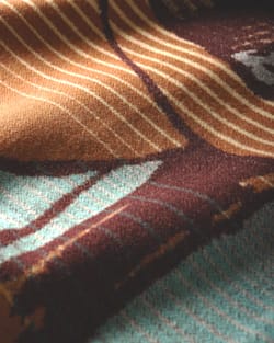 CLOSE UP VIEW OF THE LAST DROP FROM HIS STETSON SPECIAL EDITION BLANKET IN BLUE/TAN image number 4