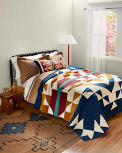 CASTLE ROCK PIECED QUILT SET IN NAVY MULTI image number 1