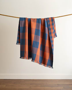 BLOCK PLAID ORGANIC COTTON FRINGED THROW IN COPPER/INDIGO image number 1