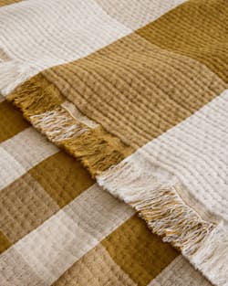 ALTERNATE VIEW OF BLOCK PLAID ORGANIC COTTON FRINGED THROW IN OCHRE/IVORY image number 4