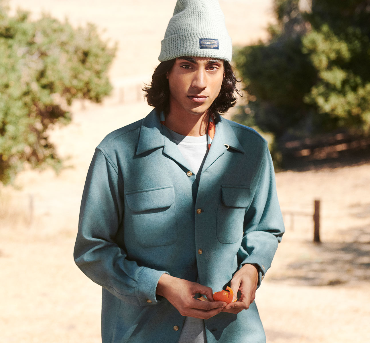 Man Wearing Wool Shirt Standing Outside